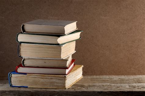 Pile of old books ~ Education Photos on Creative Market